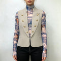 Model wearing beige double‑breasted tailored vest front outfit view