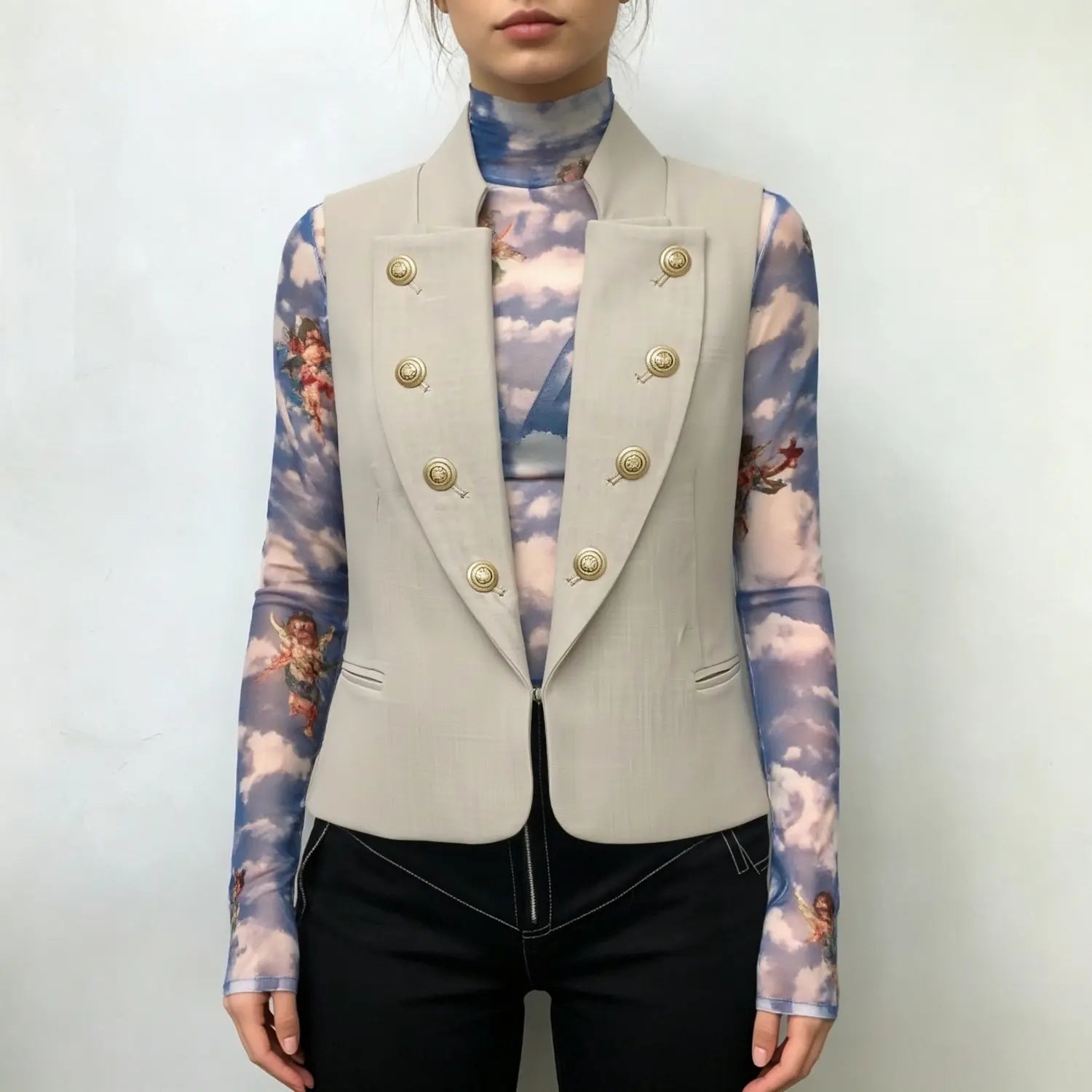 Model wearing beige double‑breasted tailored vest front outfit view