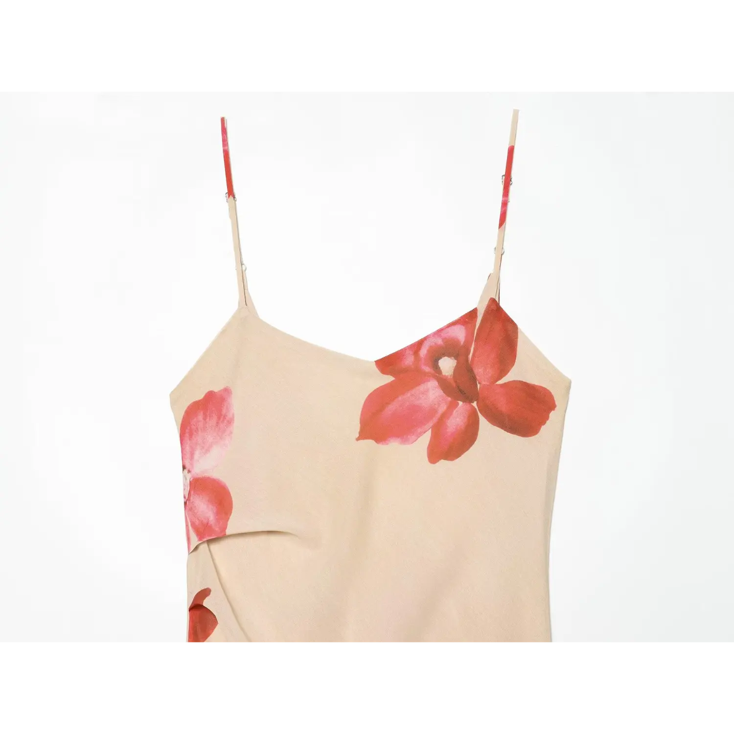 Close-up of beige floral maxi dress bust and thin straps, red pink orchid print, soft draped fabric