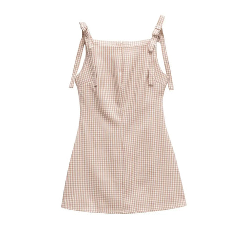 Full back flat view of a beige gingham mini dress with bow straps, center back zipper, and A-line silhouette.