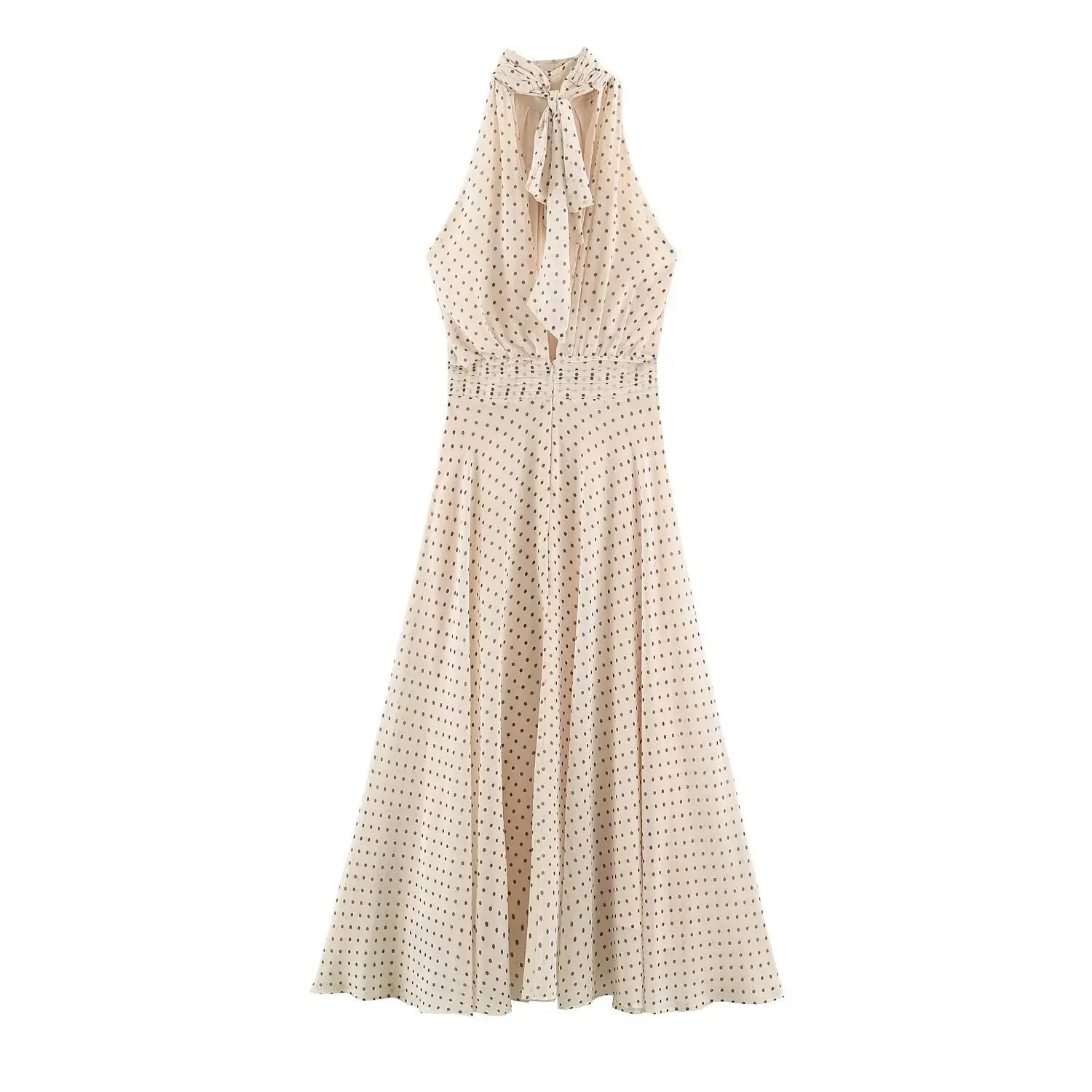 Back view beige polka dot halter maxi dress, tie-back halter neck and open back detail