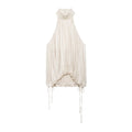 Studio white background full front shot of beige satin vertical pleated halter top, folded stand collar, back button closure, adjustable side drawstrings, bubble hem cropped silhouette