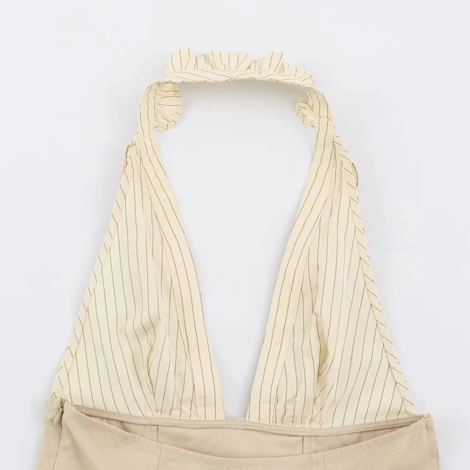 Inside back flat lay of beige striped halter mini dress, deep V neck design