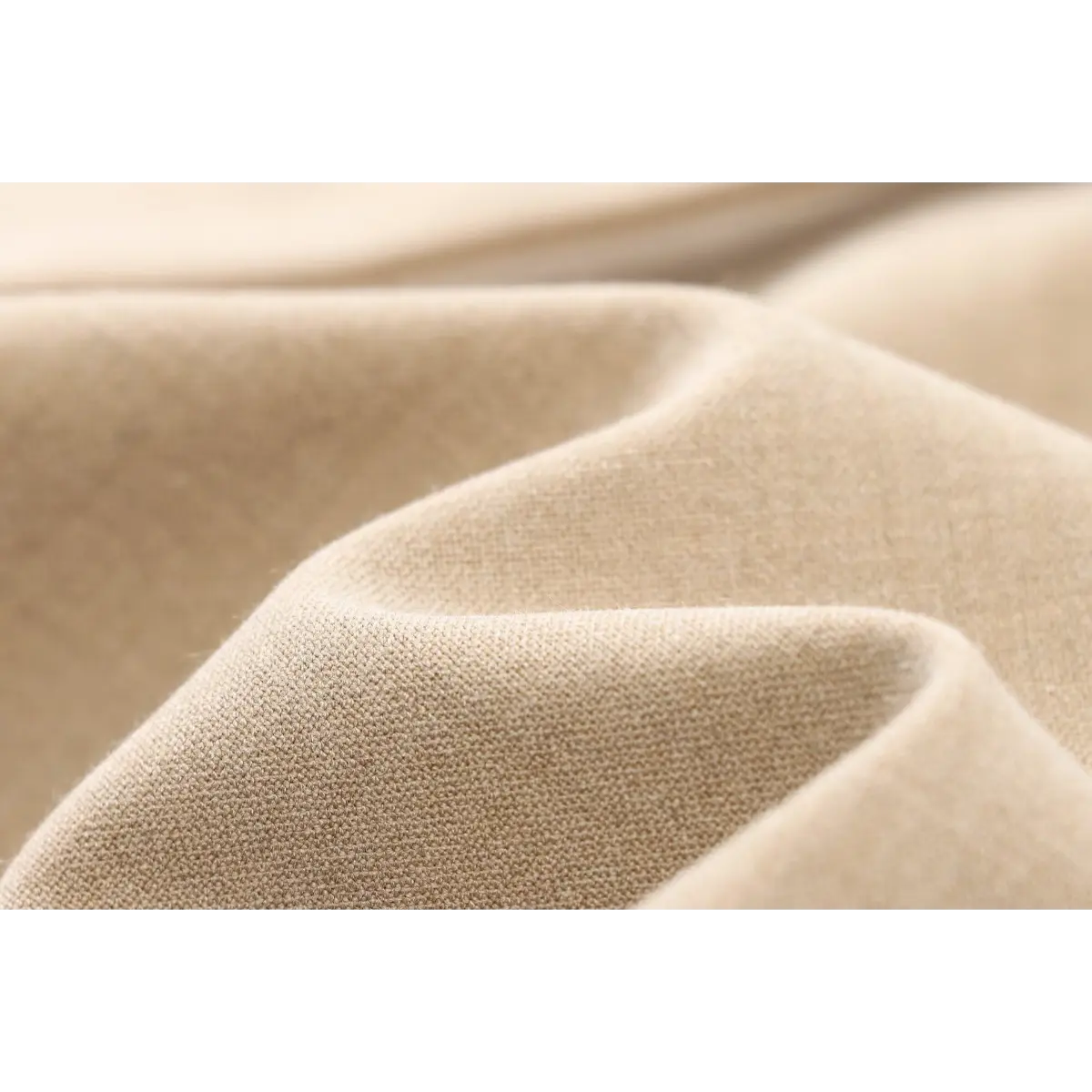 Close-up of the premium woven fabric texture of the beige mini dress, showcasing its subtle sheen and soft drape.