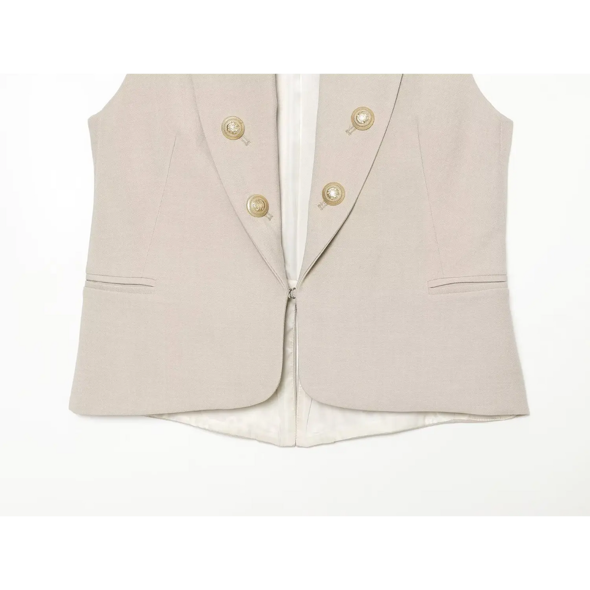 Flat view front slip pockets, hem and inner zipper closure detail