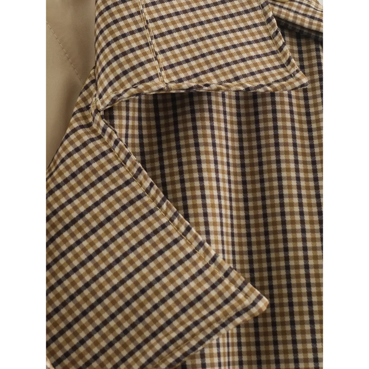 Close-up of gingham lapel collar detail