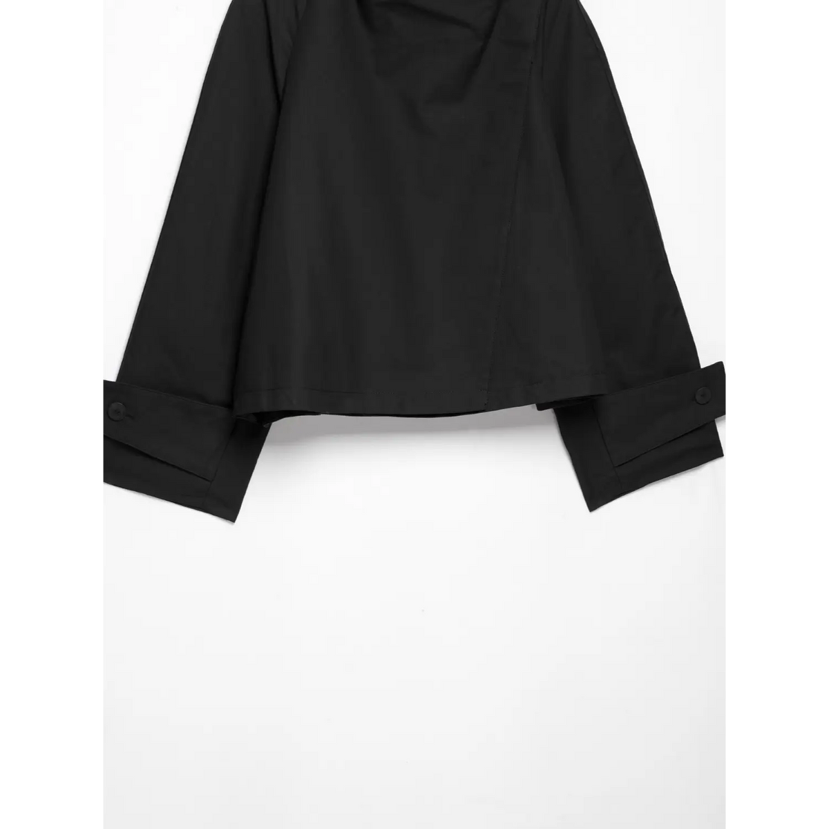 Full front flat lay of black women cropped jacket, long sleeves with button cuffs, loose boxy silhouette