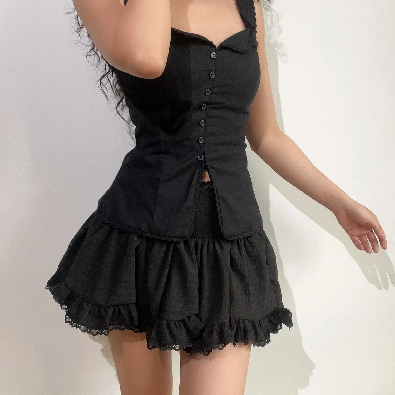 Black textured cake mini skirt match black lace cami side shot, full goth sweet vibe big gathered cake hem lace ruffle bottom y2k outfit display