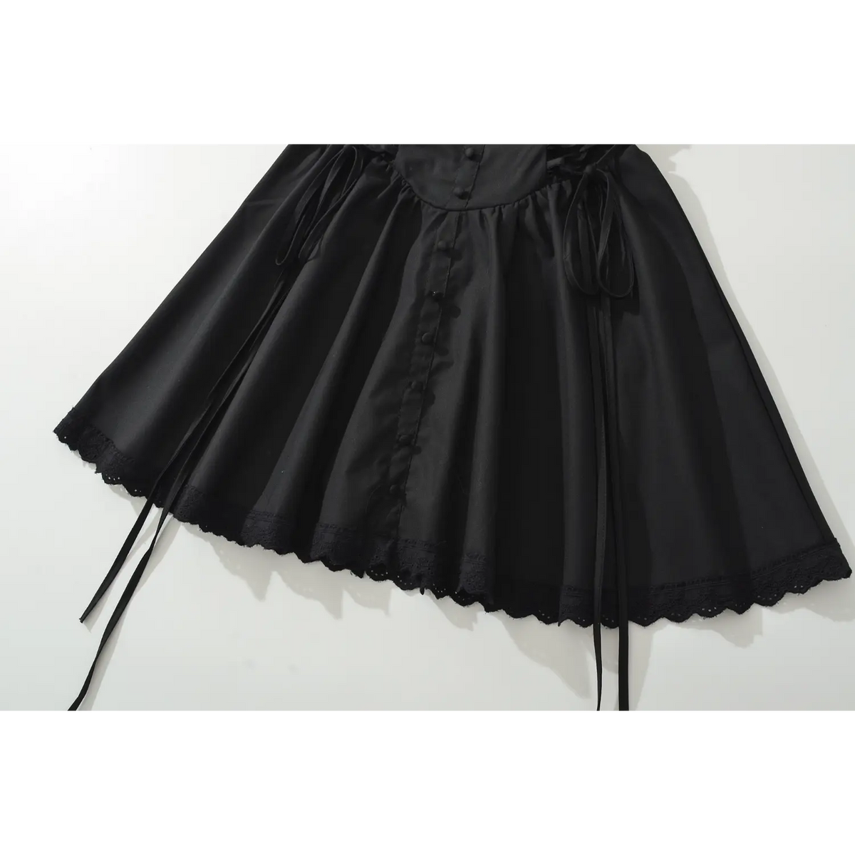 Black mini dress flared skirt with scalloped lace hem and front button details