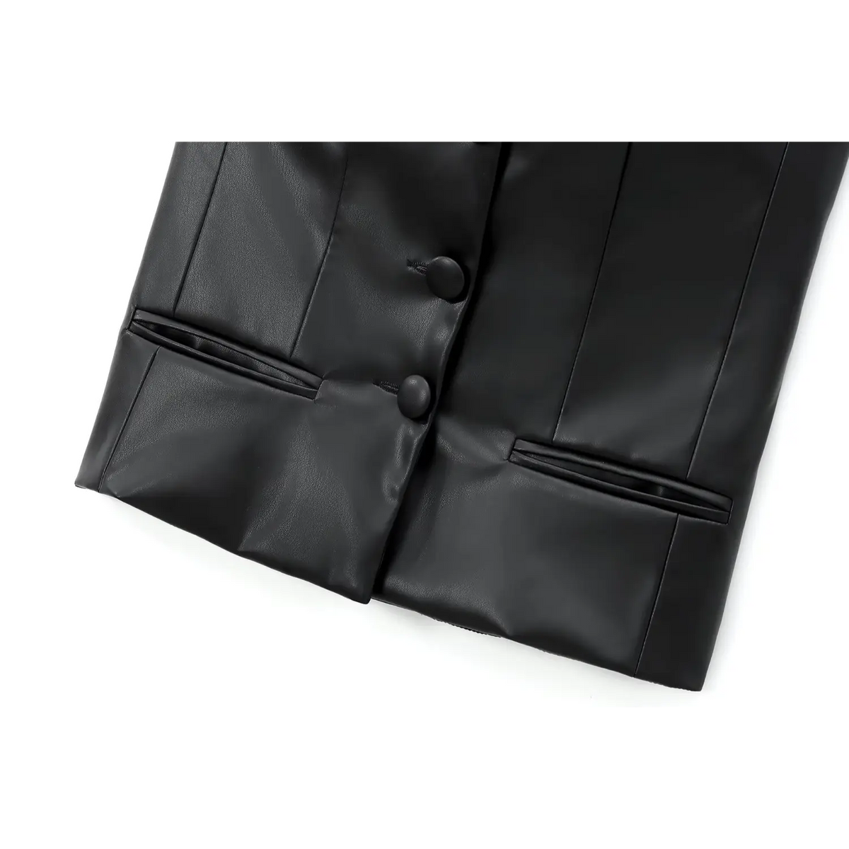 Close-up of front buttons and slanted welt pockets