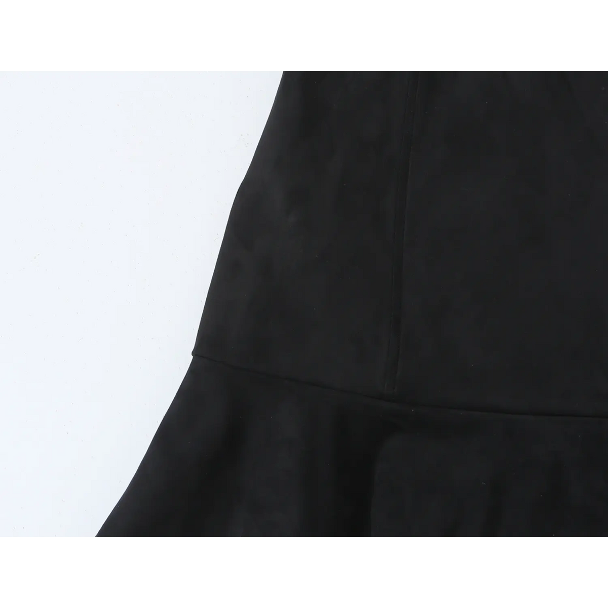 Close-up of waist seam and ruffle attachment