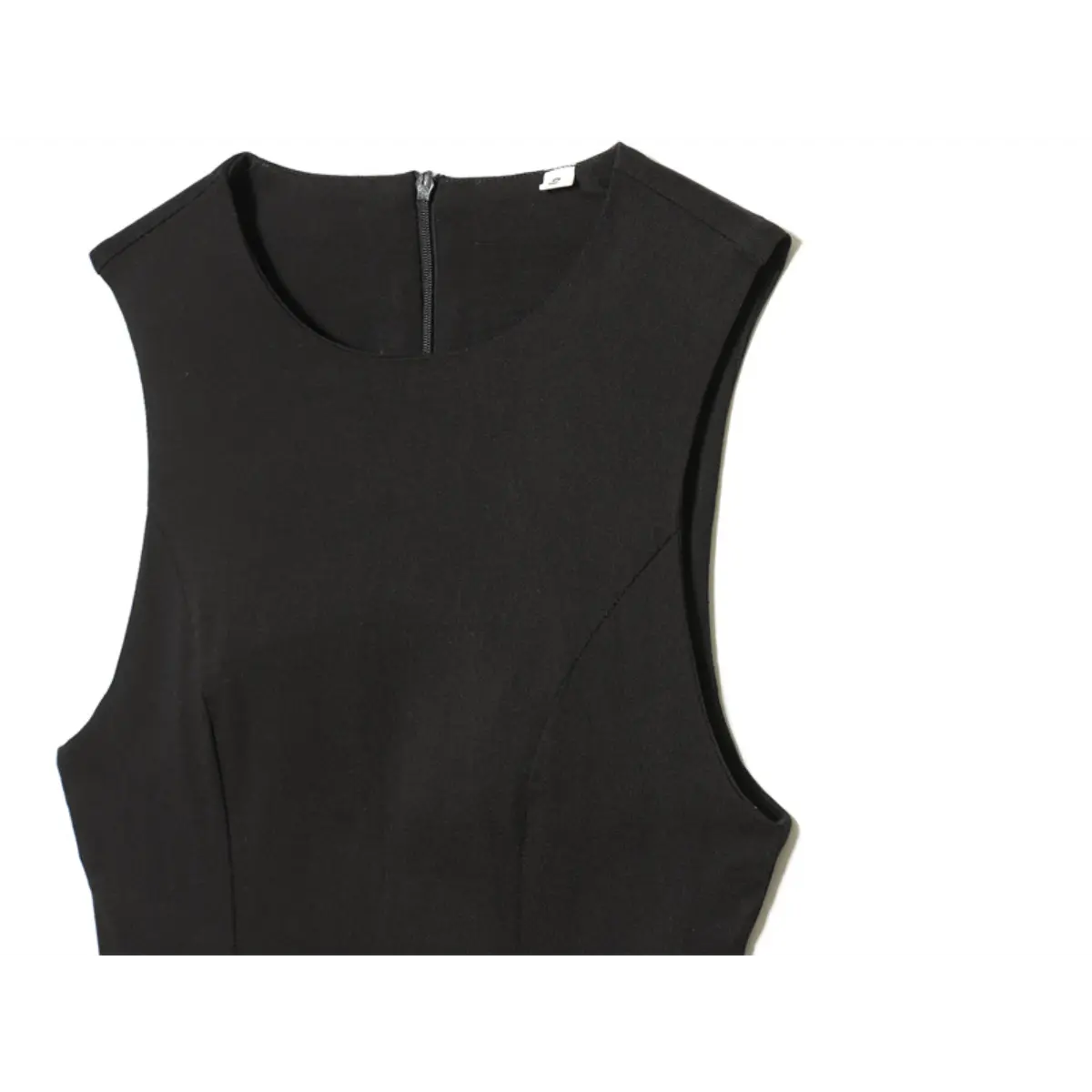 Front view of the black dress bodice, showing the round neckline, sleeveless design, and back zipper