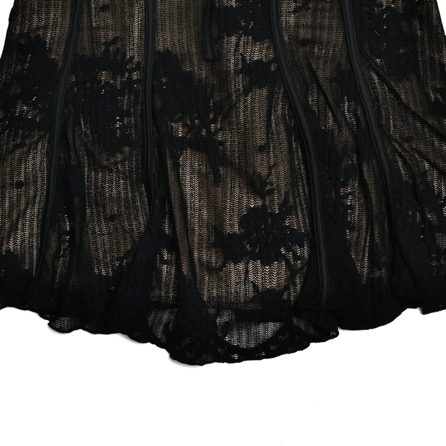 Close‑up flat lay black floral lace mini dress flared skirt hem and corset seam fabric texture