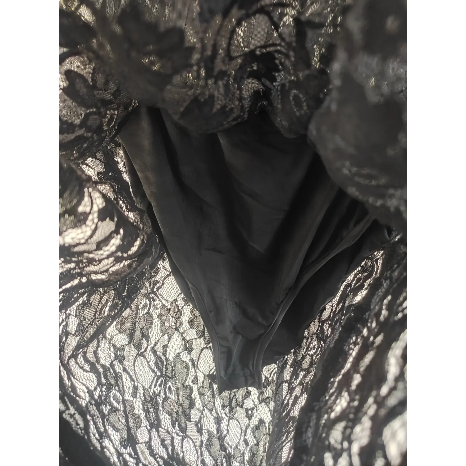 Inner solid lining view, sheer black floral lace maxi dress fabric detail | Detail