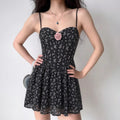 Lifestyle shot of rose decor corset floral mini sundress