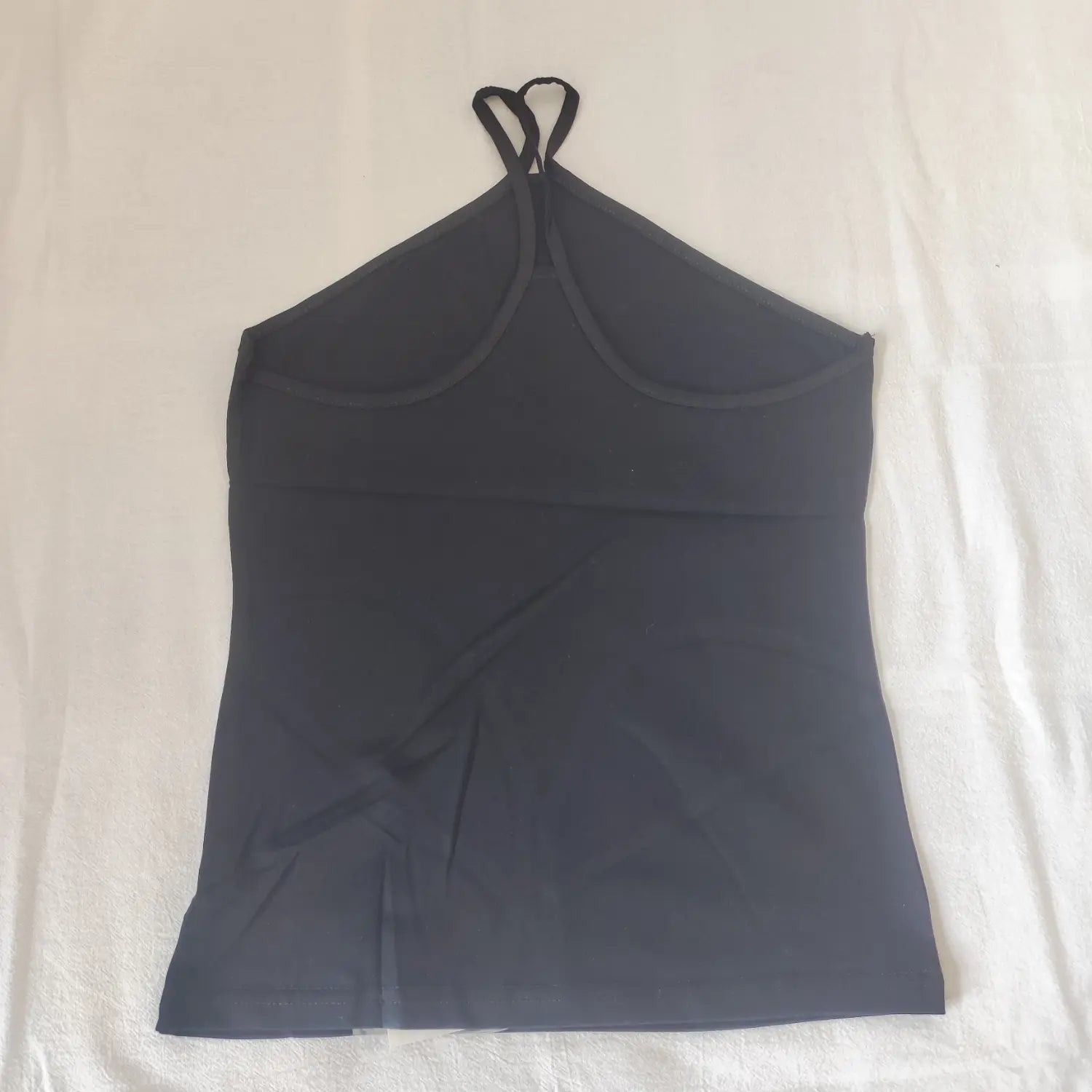 Flat lay full back view black halter tank top with crisscross halter straps