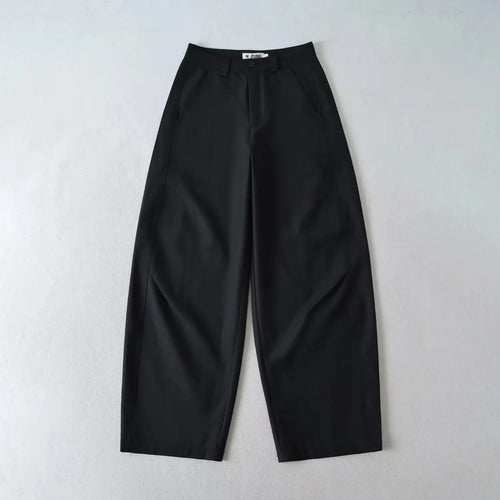 Single black high waist wide leg tailored suit trousers front view flat lay on white background, relaxed fit casual dress pants