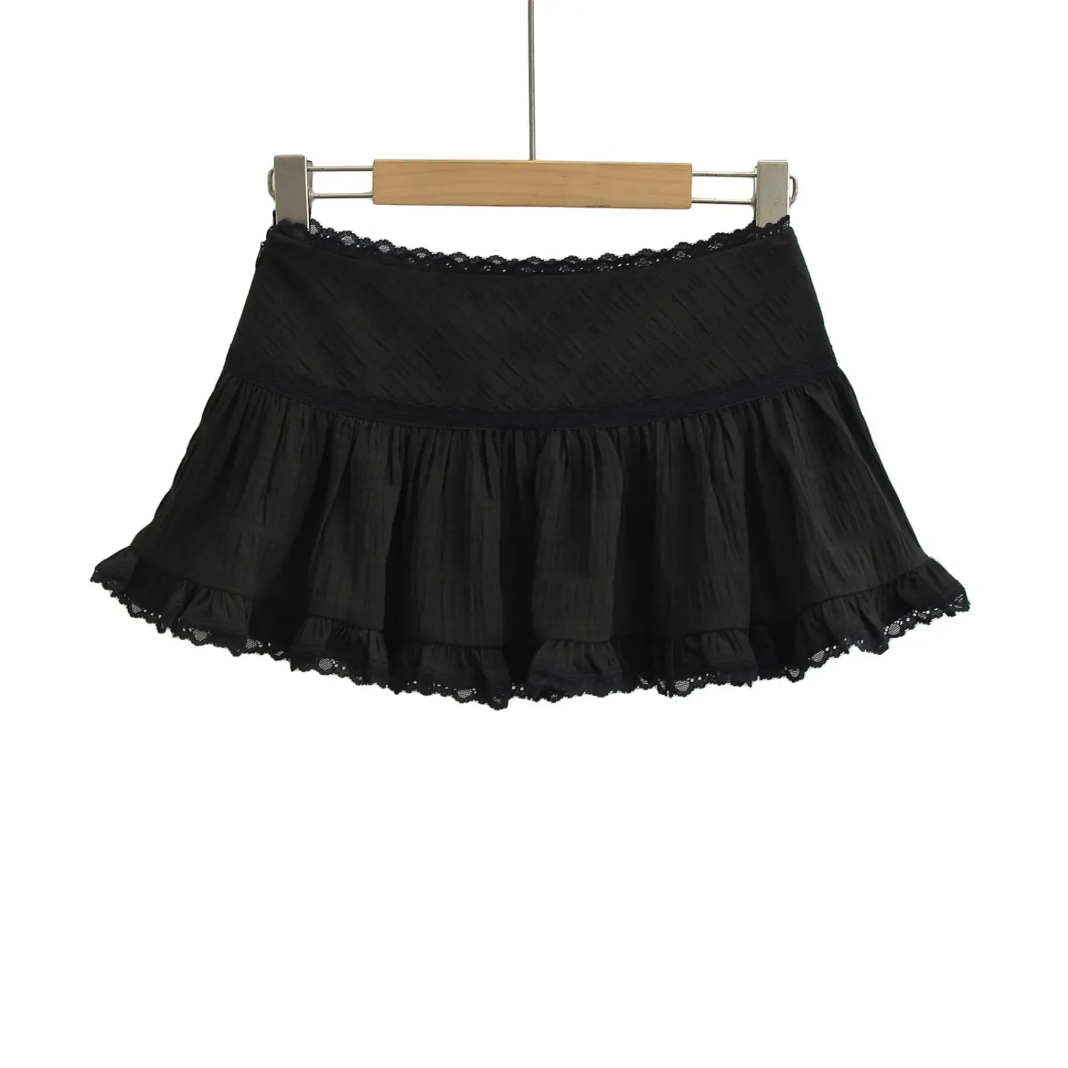 Black diamond textured lace cake mini skirt wooden hanger front shot, high waist scallop lace waistband layered gathered swing hem double eyelet lace hem goth feminine short skirt hero shot