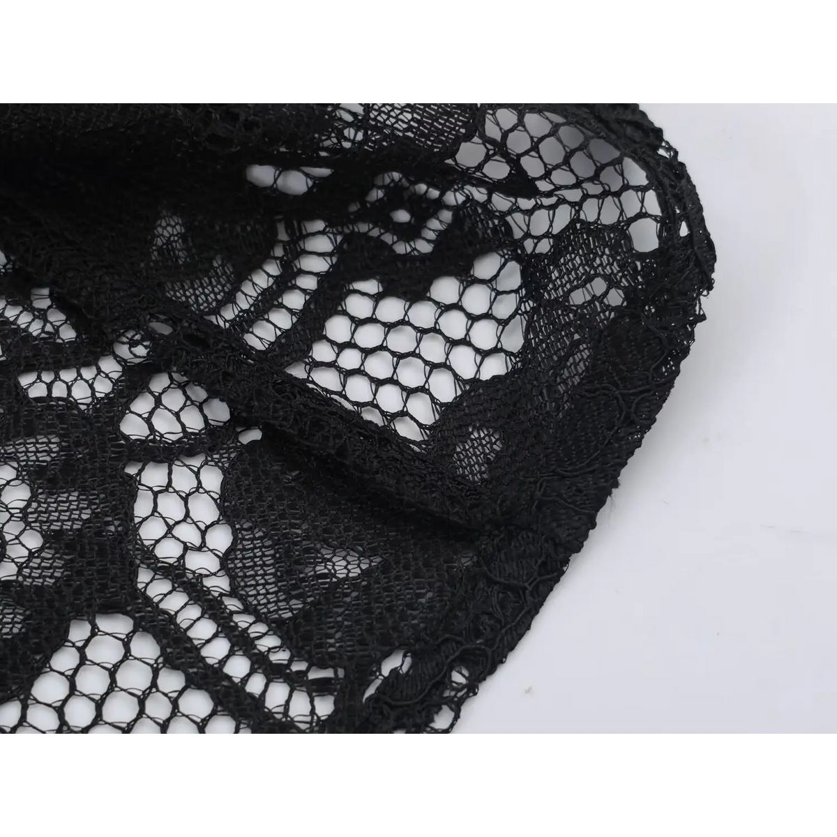 Close-up of scalloped lace trim detail