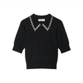 Front flat lay of black pearl collar knit top
