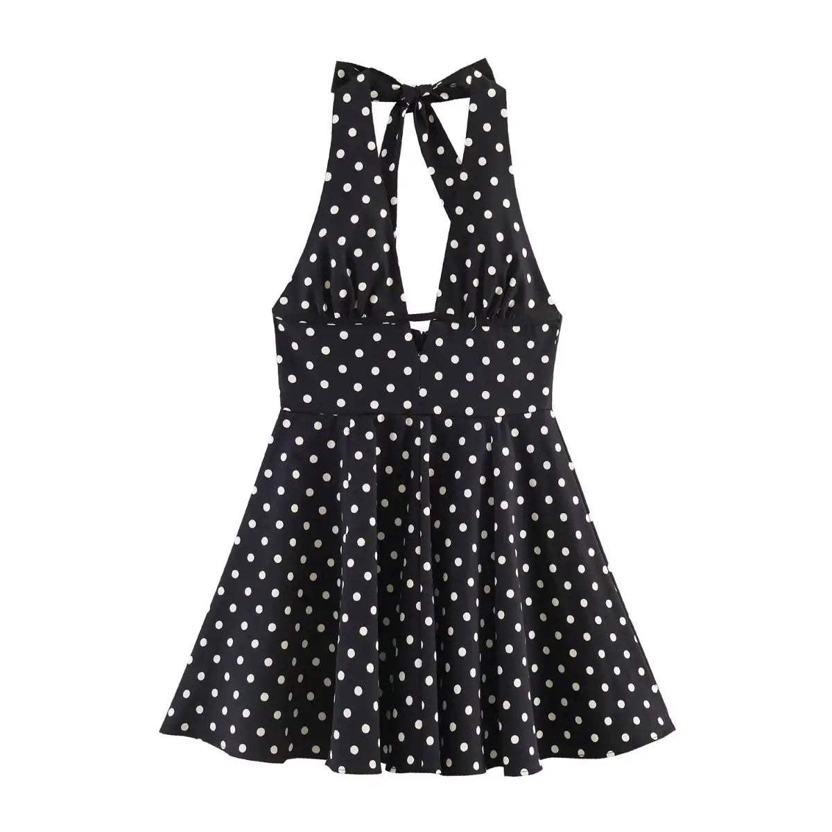 Full front view of black polka dot halter dress, showing deep V-neck, cutout detail and flared skirt.