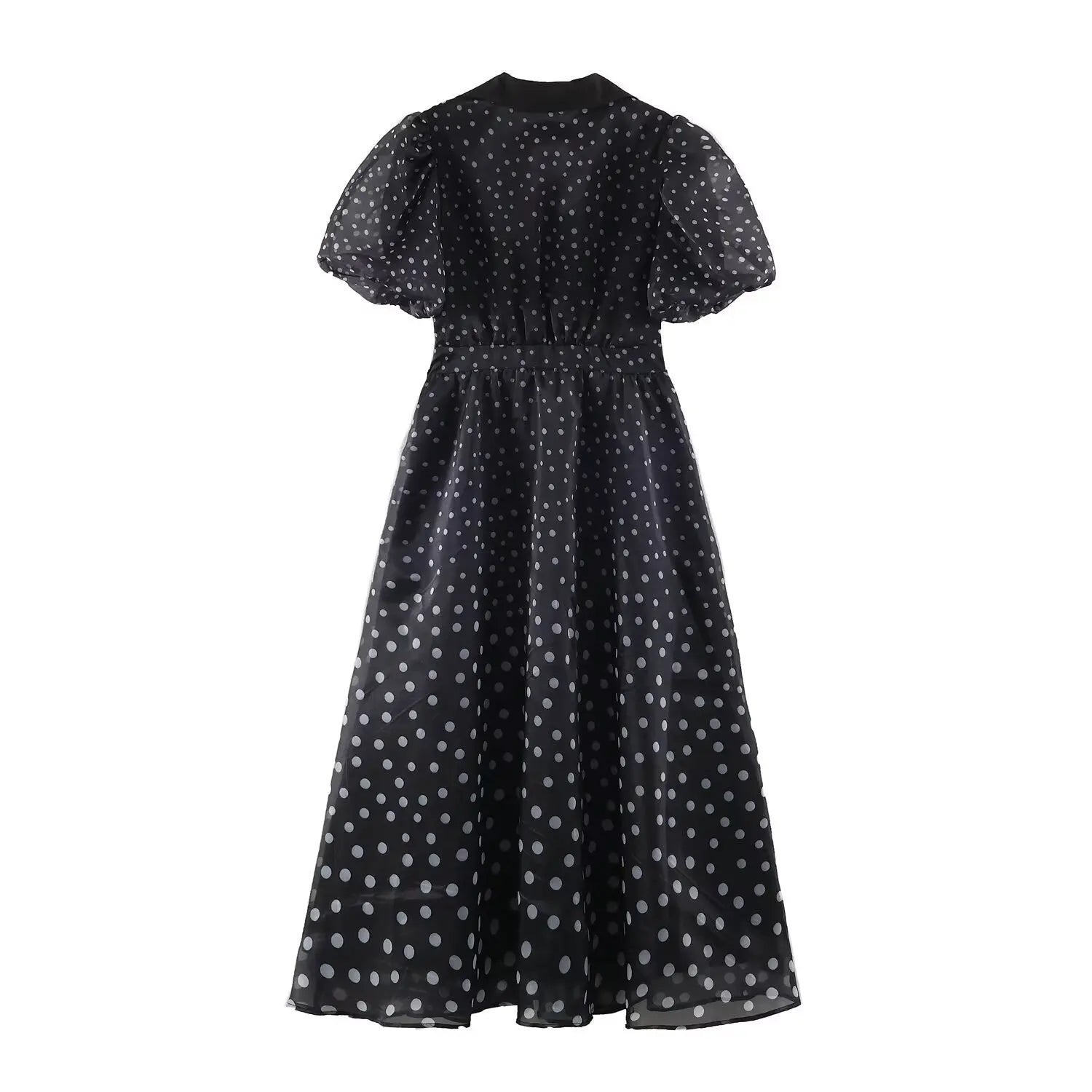 Back view black polka dot maxi dress, puff short sleeves, elastic waist, flowy long maxi skirt