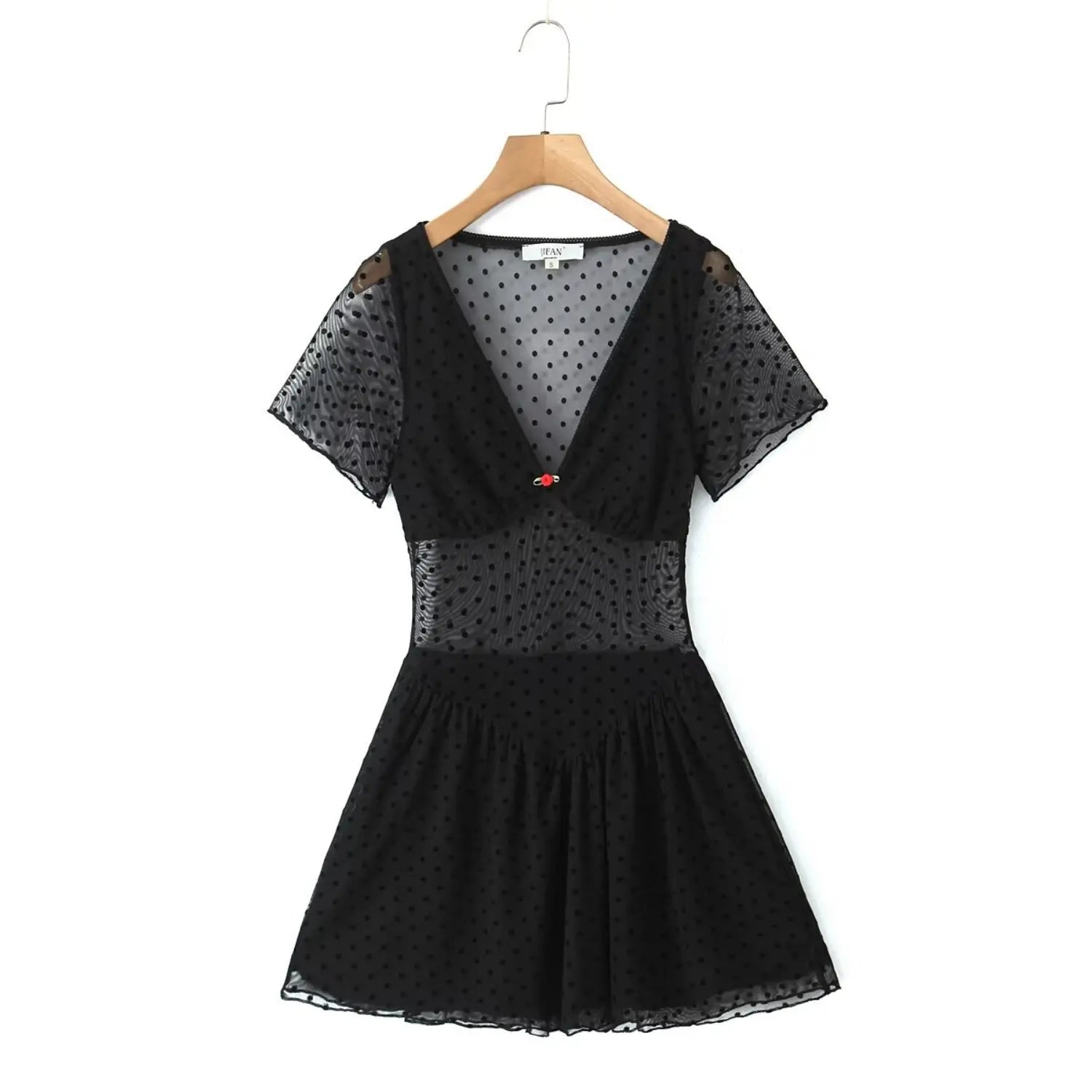 Black polka dot mesh mini dress on wooden hanger, v‑neck short sleeve sheer mesh dress with red rose front detail