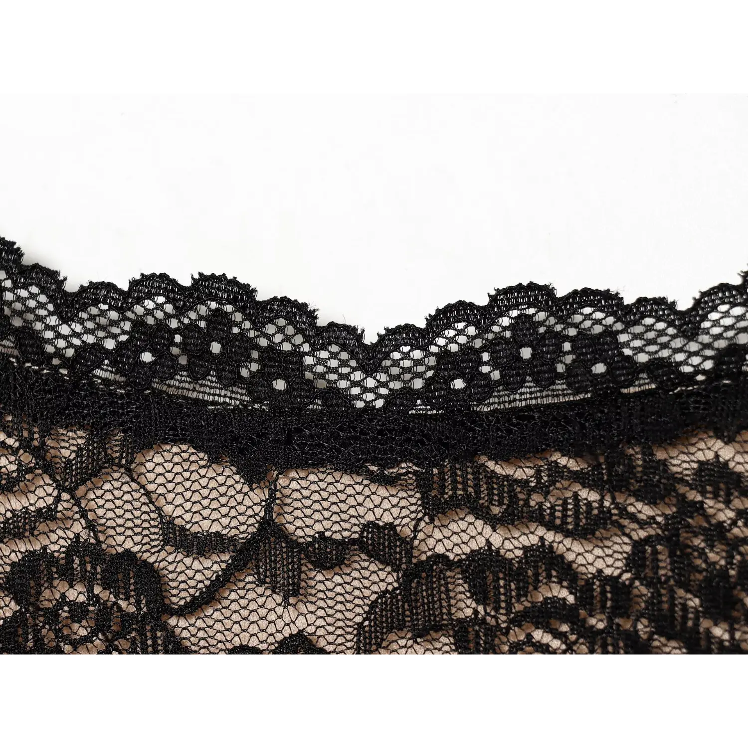 Extreme close‑up scalloped hem lace edge black rose lace cami maxi dress