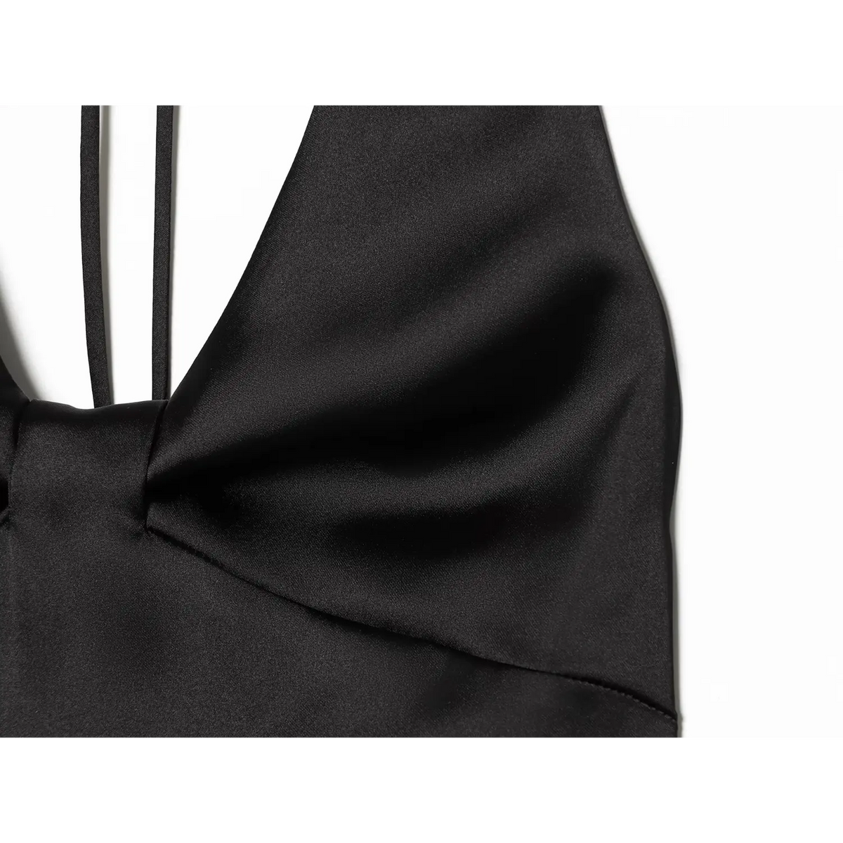 Close-up of satin fabric and armhole