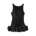 Full front view on white background of black sequin party dress with ruffled hem