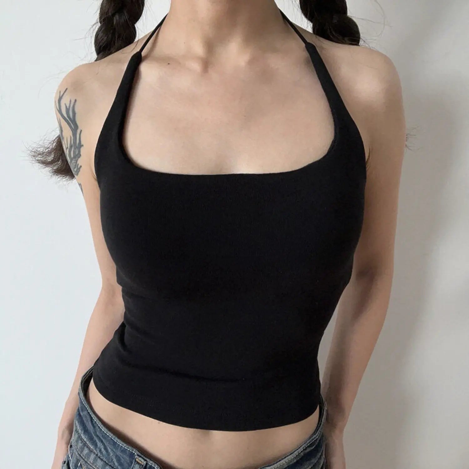 Black square halter knit cami half body model shot, dark whitening stretch knit minimalist halter neck retro cool girl cropped tank shot
