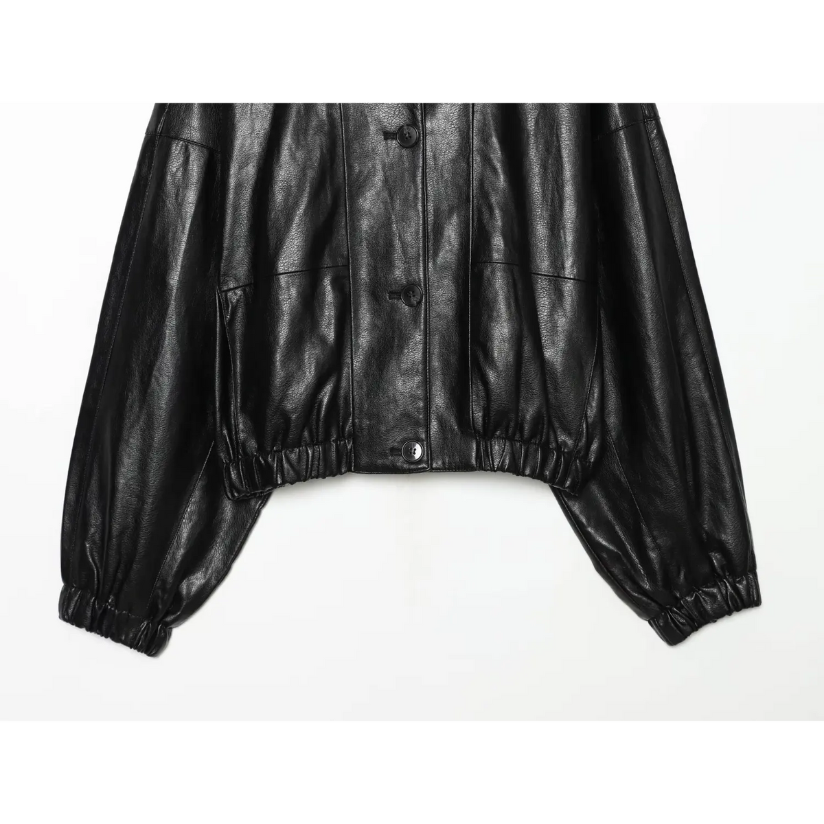 Close-up of elasticated hem, pockets and cuffs