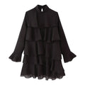 Black tiered ruffle high neck mini dress, front flat lay