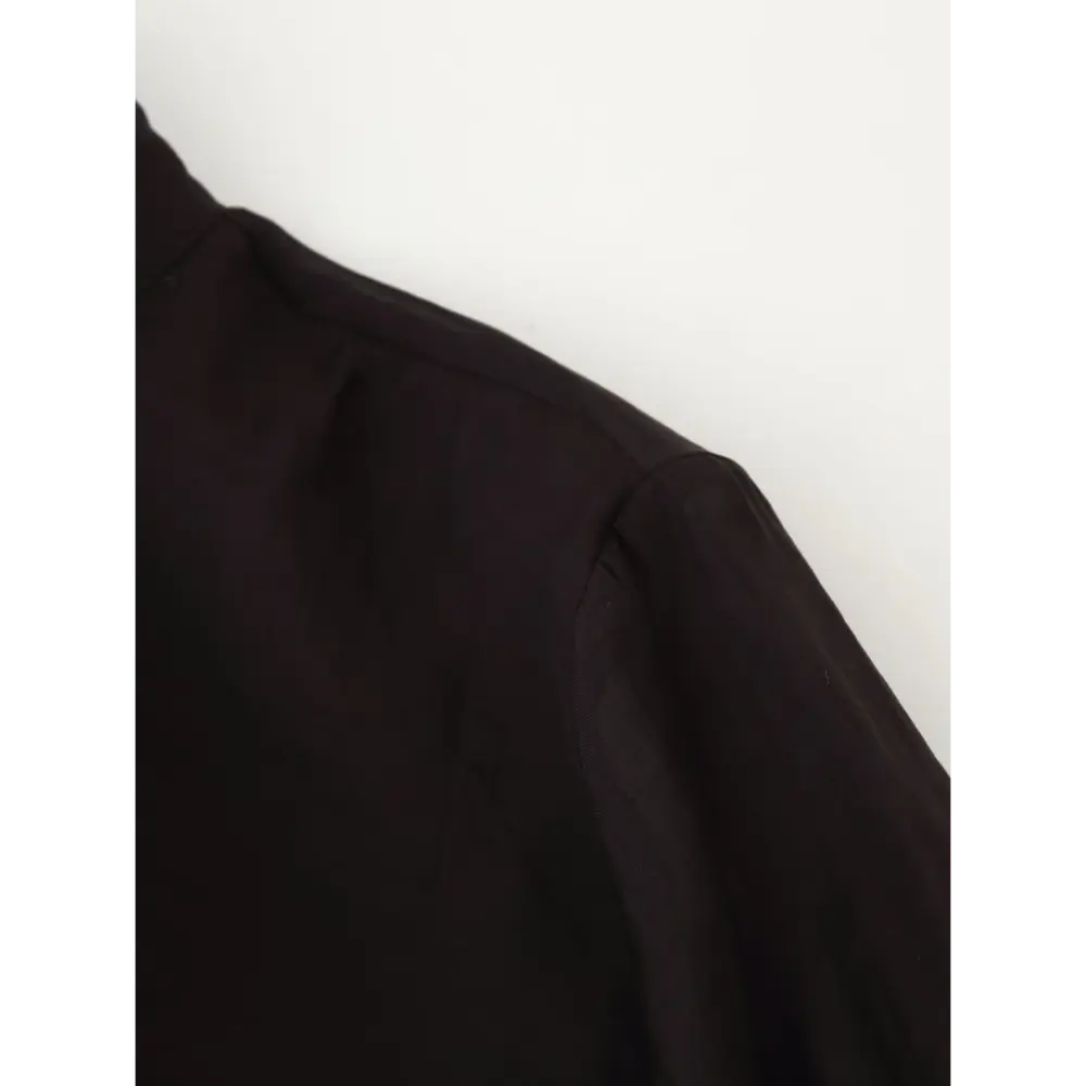 Close-up of shoulder seam and chiffon fabric