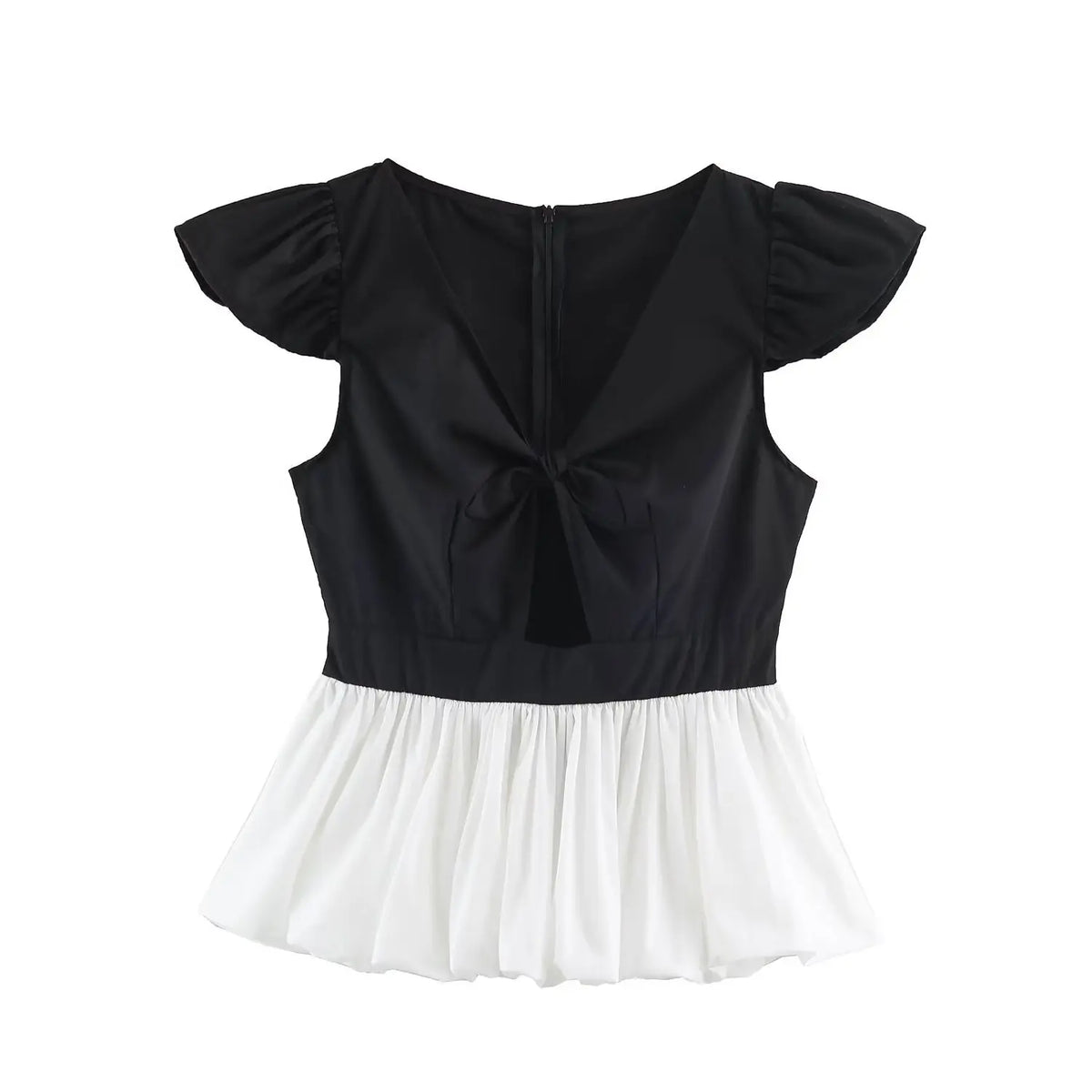 Front view of black and white peplum top with bow cutout and pleated skirt hem