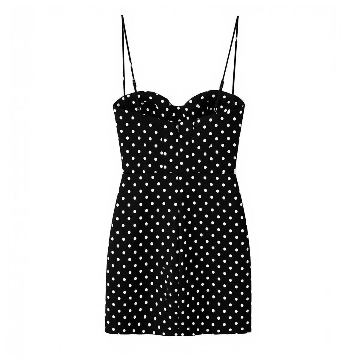 Back view of the black polka dot mini dress, featuring corset-style cups, thin spaghetti straps, and a fitted silhouette.