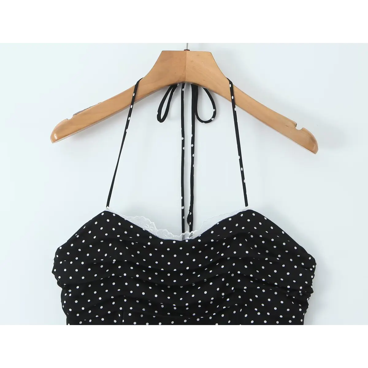 Close-up of the halter neck ties and the gathered ruched bust.