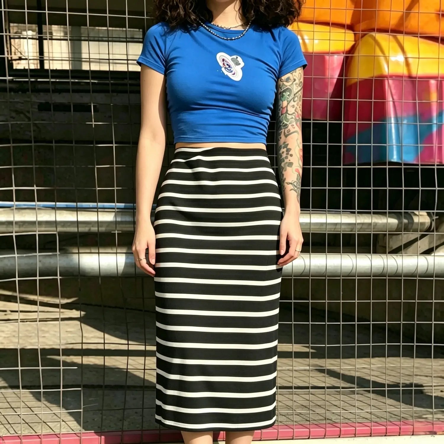 Front model shot black and white horizontal stripe fitted midi pencil skirt