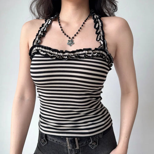 Front view of the same top, highlighting the ruffled halter neckline and fitted silhouette.