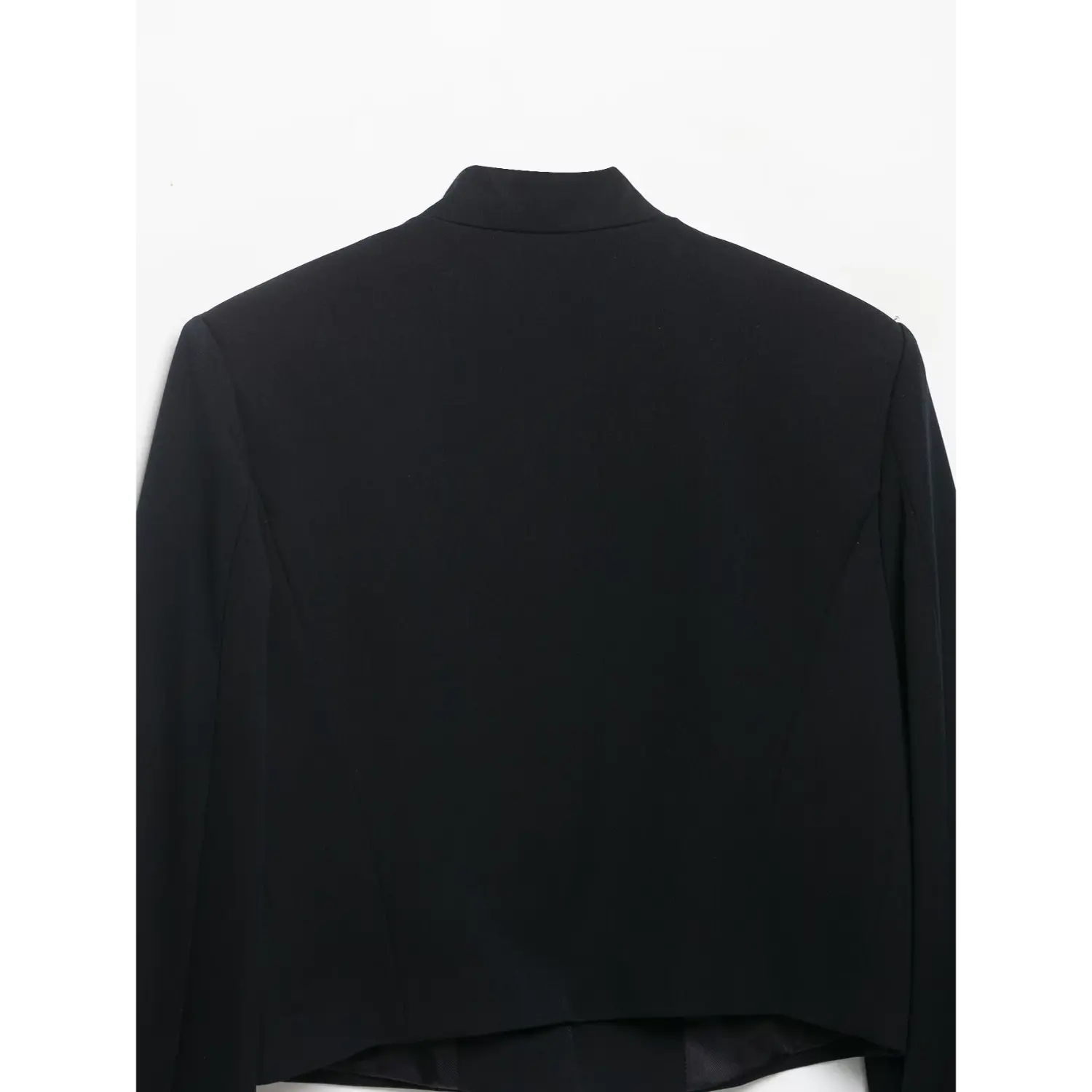Full back flat view of black cropped military blazer with stand collar