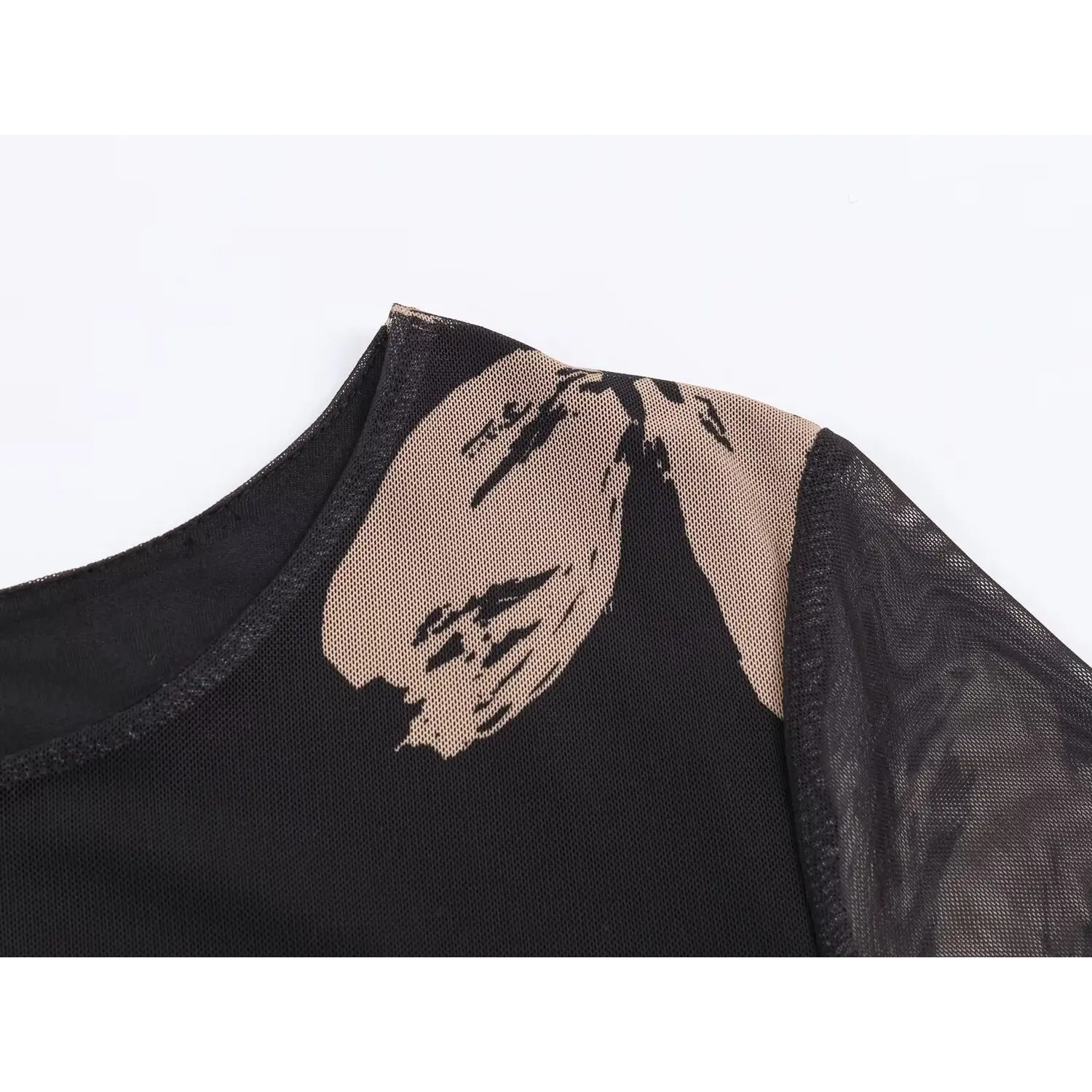 Shoulder close‑up,mesh fabric with beige brush floral print