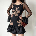 Model wearing black beige abstract floral mesh mini dress,long bell flare sleeve,ruffle hem