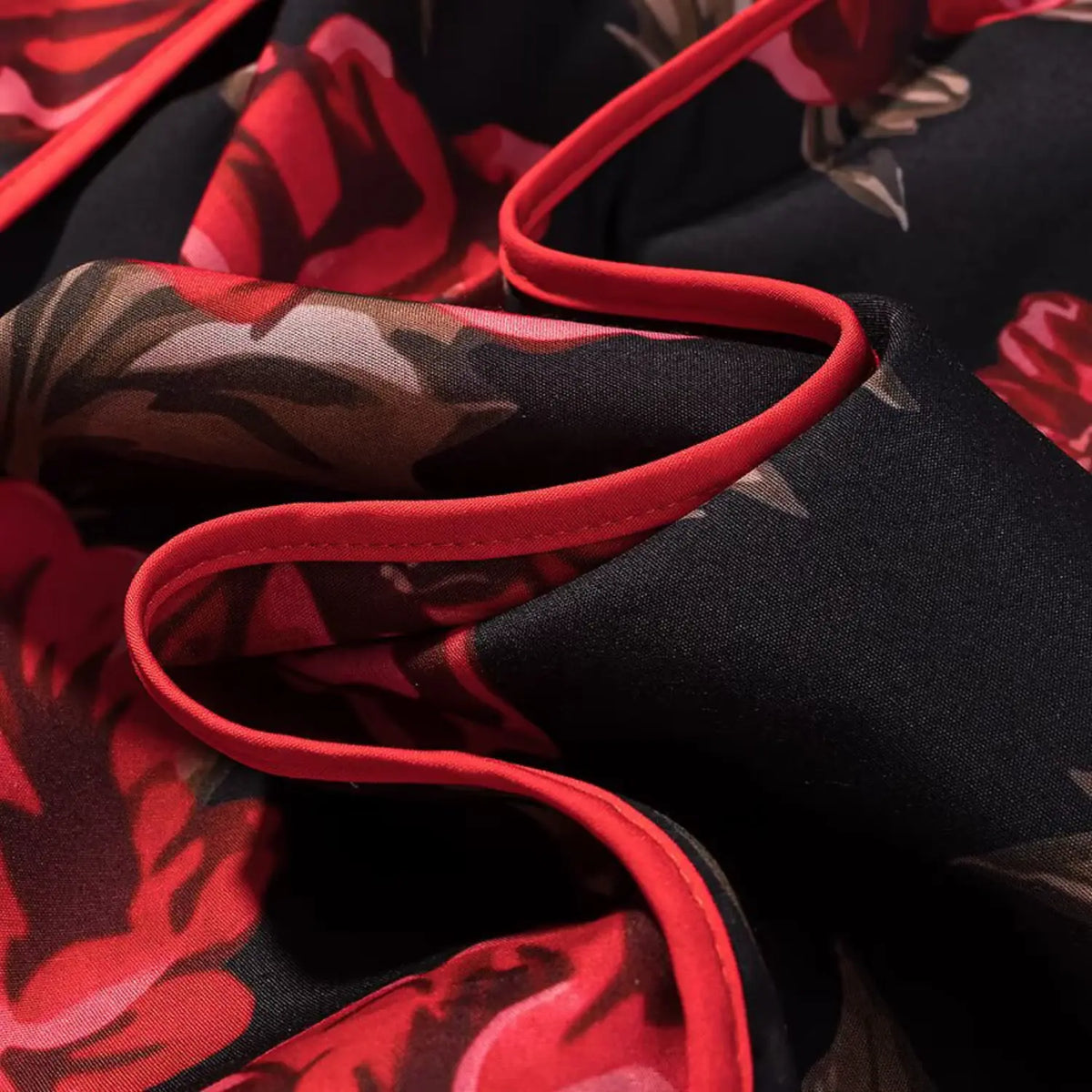 Close‑up of hem red piping trim