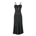 Front full view of black satin lace camisole maxi dress with asymmetrical ruffle hem