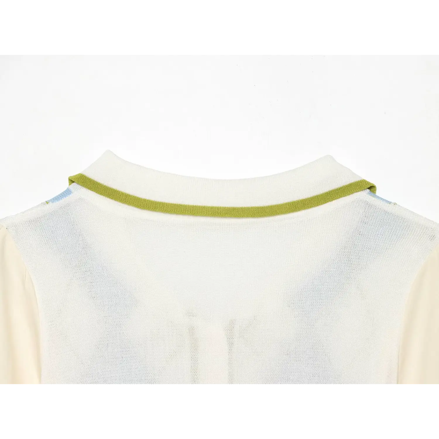 Back neckline close-up of mixed knit blouse, solid green rib contrast binding, sheer white lightweight knit back panel