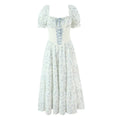 Flat lay view of the dress, highlighting the corset-style lace-up front and tiered skirt silhouette.