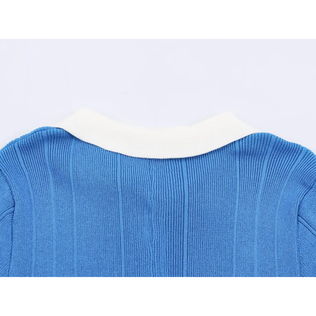 Close-up of back white collar ribbing
