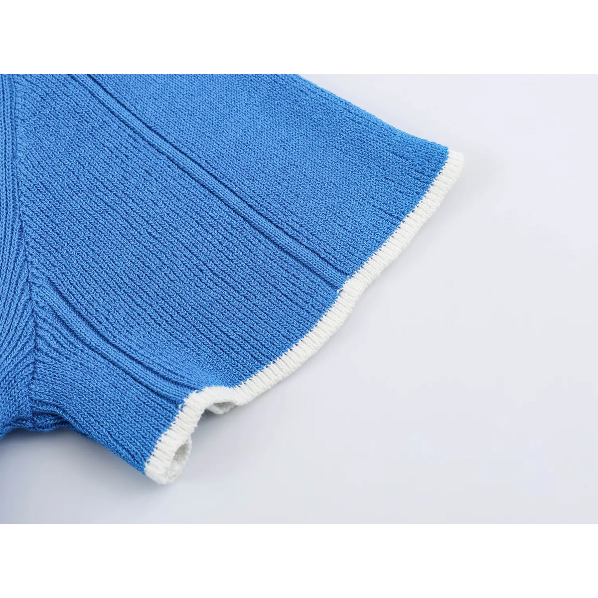 Close-up of sleeve cuff contrast trim