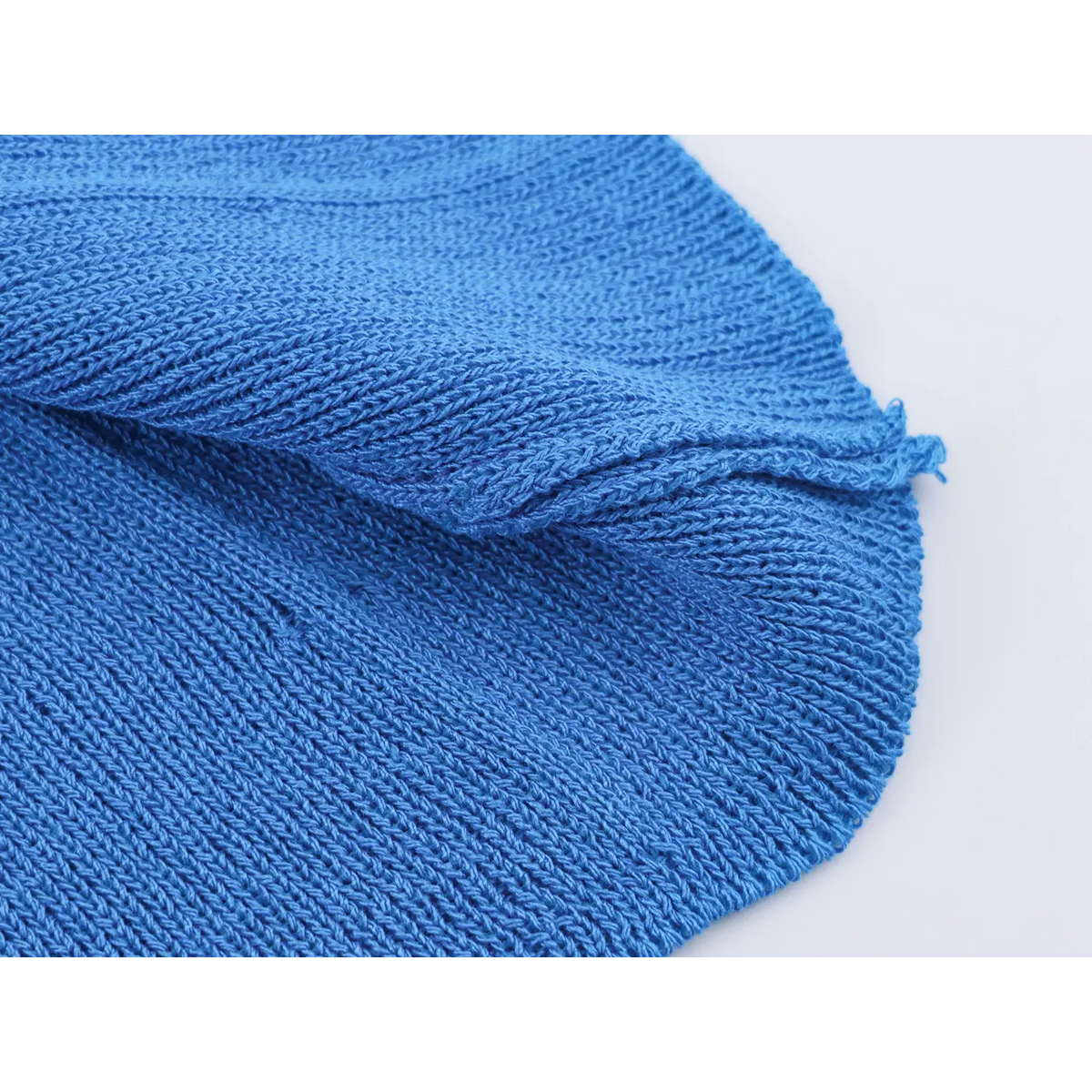Close-up of vertical ribbed knit texture