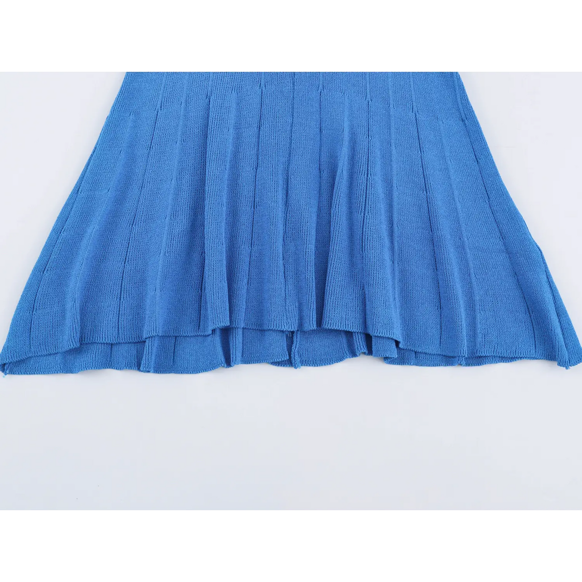 Close-up of flared dress hem